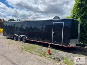lot 36 image: 2022 Titanium Tri Axle enclosed tra...