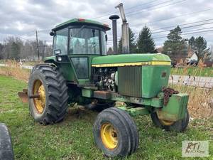 lot 100 image: John Deere 4630 tractor. Enclosed c...