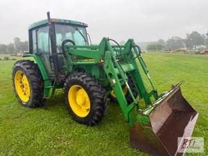 lot 102 image: John Deere 6410 Tractor. John Deere...