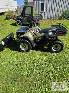 lot 131 image: 2004 Polaris Magnum 330. Comes with...