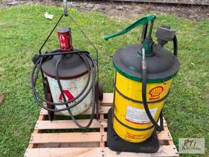 lot 50 image: (2) grease barrels with pumps...