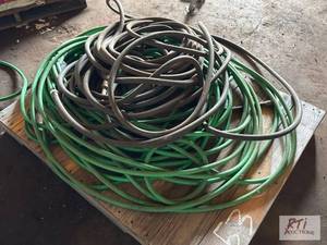 lot 53 image: Pallet of garden hoses...