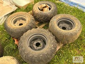 lot 19 image: (4) Kubota RTV tires and rims, used...