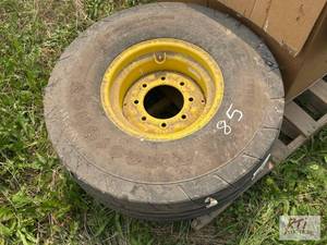 lot 85 image: New Holland tire and rim, IF320-70R...