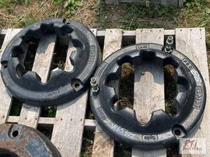 lot 88 image: (2) New Holland 50kg rear wheel wei...