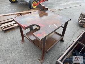 lot 134 image: Table with vise 3x3.5ft. Located...