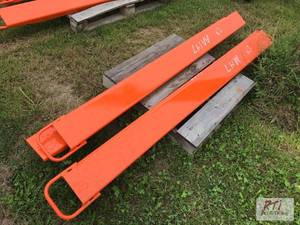 lot 80 image: 2X 76in pallet fork extensions. MD...