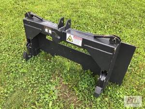 lot 234 image: Wolverine skid loader quick hitch. ...