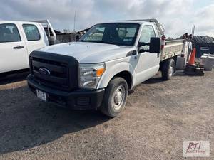 lot 7 image: 2012 Ford F250 regular cab flatbed....