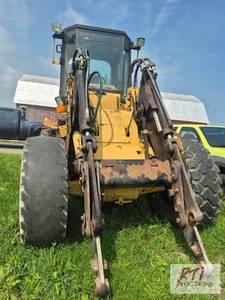 lot 65 image: Caterpillar IT24F Loader. 11,691 ho...