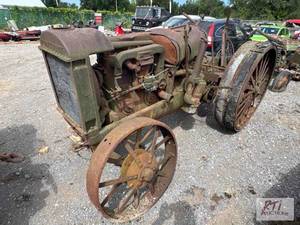 lot 107 image: McCormick-Deering 22-36 tractor....