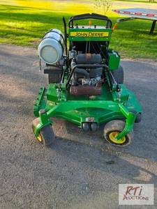 lot 121 image: John Deere R652 stand-on commercial...
