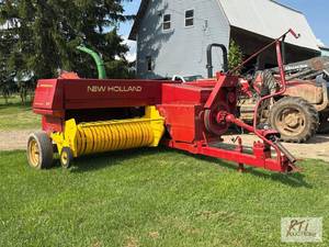 lot 141 image: New Holland 315 twine square bal...
