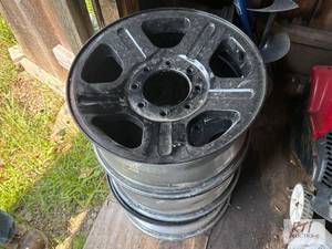 lot 254 image: Ford Lariat rims. This item is loca...
