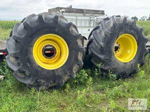 lot 257 image: 2X 35.5L32 tires on rims. This i...