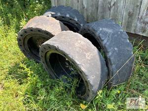 lot 262 image: (4) Skid steer solid tires. This it...