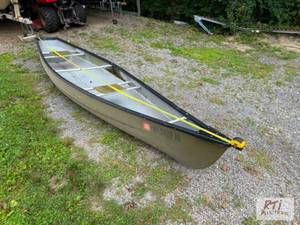 lot 269 image: 13FT Fiberglass Canoe and gas outbo...