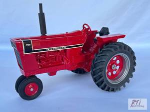 lot 8 image: International 766 tractor, narrow f...