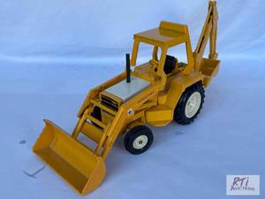 lot 12 image: International toy backhoe...