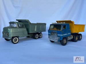 lot 15 image: (2) metal dump trucks...
