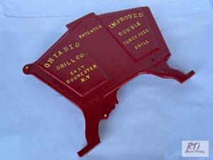 lot 18 image: Ontario grain drill cast iron plate...
