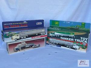 lot 20 image: (4) Toy tanker trucks in boxes...
