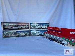 lot 21 image: (4) Hess collectible vehicles and M...