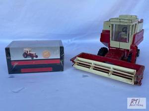 lot 23 image: International 815 combine and Inter...