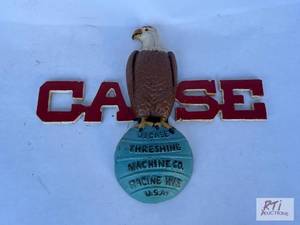 lot 61 image: Case eagle cast iron anitque logo...