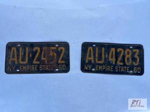 lot 64 image: (2) license plates...