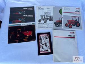 lot 77 image: International and Case tractor broc...