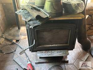 lot 153 image: Wood stove and chimney lot, include...