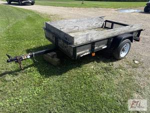 lot 34 image: Tractor Supply Co. utility trailer,...