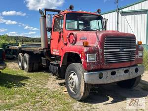 lot 43 image: 1982 Ford LT9000 rollback truck. VI...