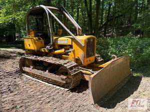 lot 53 image: 1964 John Deere 450 dozer. 4,975 ho...