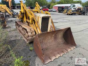 lot 55 image: John Deere crawler loader. Does run...
