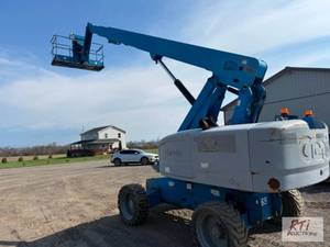 lot 73 image: 2014 Genie S-65 Lift. 65FT max heig...