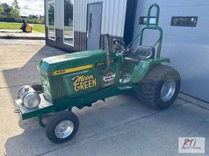 lot 92 image: John Deere 430 Green Machine pullin...