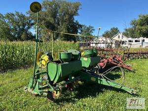 lot 132 image: John Deere 494 4 row corn planter. ...