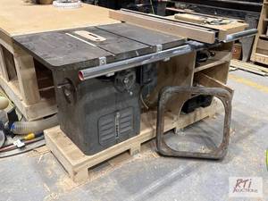 lot 215 image: Delta Unisaw table saw. Mid-1960s m...