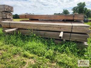lot 239 image: (70) 1.25in X 5.5in X 16ft rough cu...