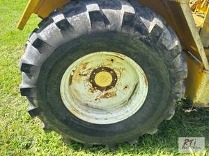 lot 292 image: Titan 16.9-24 10-ply tractor tire m...