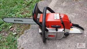 lot 320 image: STIHL 038AV Chain Saw. The item is ...