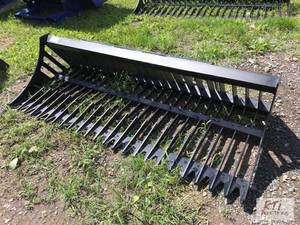 lot 9 image: New 78in rock bucket for skid steer...
