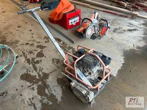lot 74 image: Husqvarna walk behind masonry saw #...