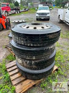 lot 82 image: (8) aluminum wheels and (6) 24.5 ti...