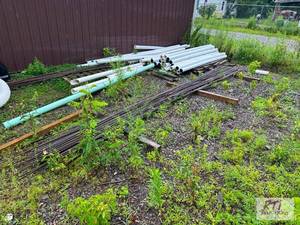 lot 91 image: (2) Piles of rebar #33...