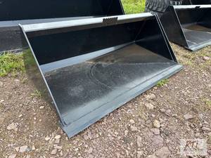 lot 15 image: Swict 60in bucket for skid loader....
