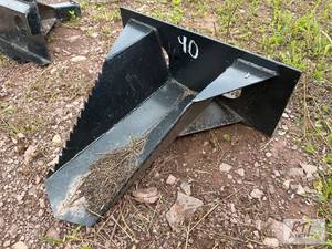 lot 40 image: Tree spade for mini skid loader....