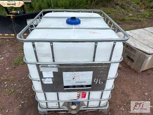 lot 46 image: 275 gallon caged poly tank....
